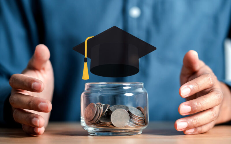 Interest rates for student loans in India 2025 showing savings jar and graduation cap