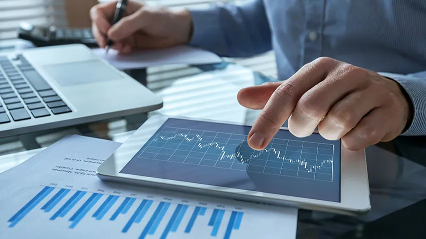 What is a demat account showing digital stock trading analysis on tablet and laptop