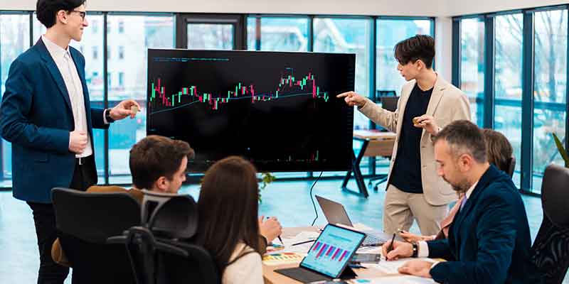 How to start investing in the stock market with beginners discussing stock charts and market trends